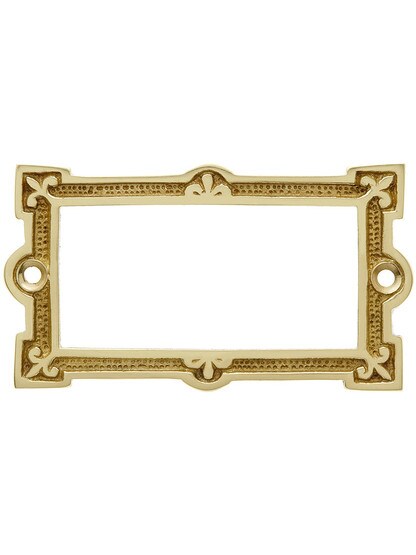 Fleur de Lis Label Holder in Unlacquered Brass.